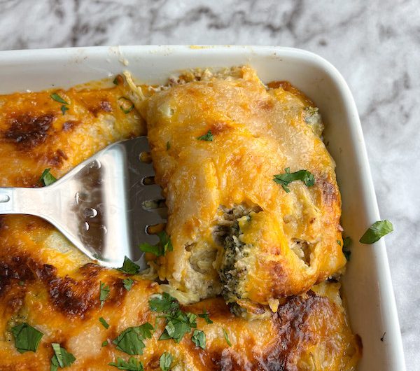 Healthy and Cozy Broccoli Cheddar Spaghetti Squash Bake (Plant-Based!)